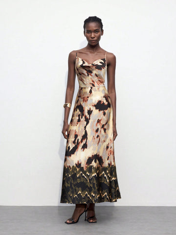 Introducing the Blooming Beauty dress - a must-have for any fashion-forward individual. This backless dress features a flattering draped neckline and a stunning floral print, perfect for any occasion. Elevate your style with this elegant piece.