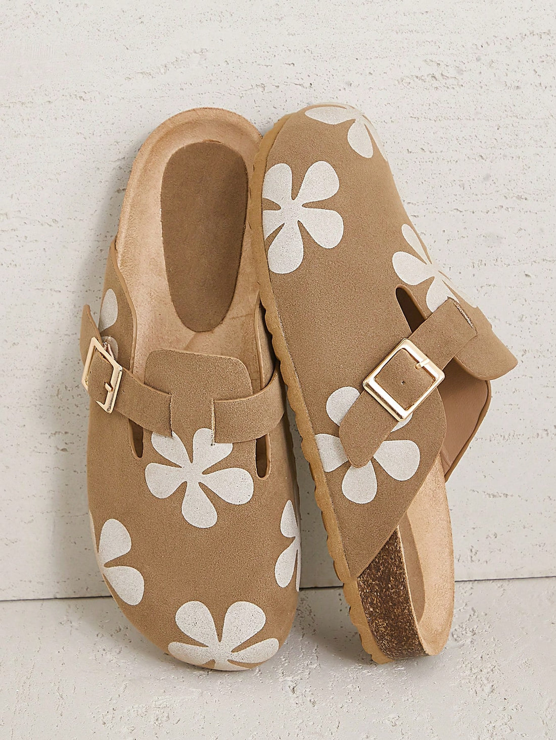 Unleash your inner flower power with Blooming Comfort's Floral Print Slip-On Taupe Mules. These stylish shoes are perfect for summer strolls and make a charming Valentine's gift. Slip into comfort and style with these blooming beauties.
