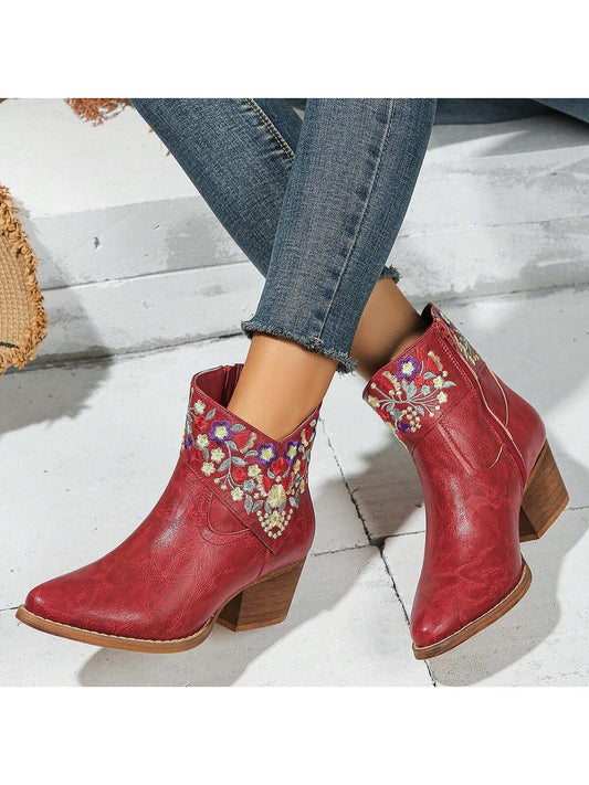 Introducing the Blooming Style: Women’s Colorful Floral Wedge Heel Short Boots with Side Zipper. A perfect blend of fashion and function, featuring a vibrant floral design and a comfortable wedge heel. The side zipper allows for easy on and off, making these boots a must-have for any stylish and on-the-go woman.