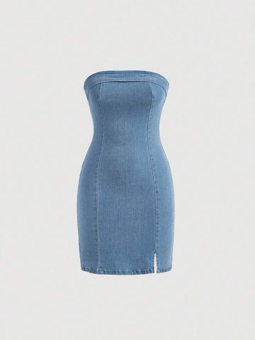 Front view of light-wash blue strapless denim mini dress with fitted shape and twin slits
