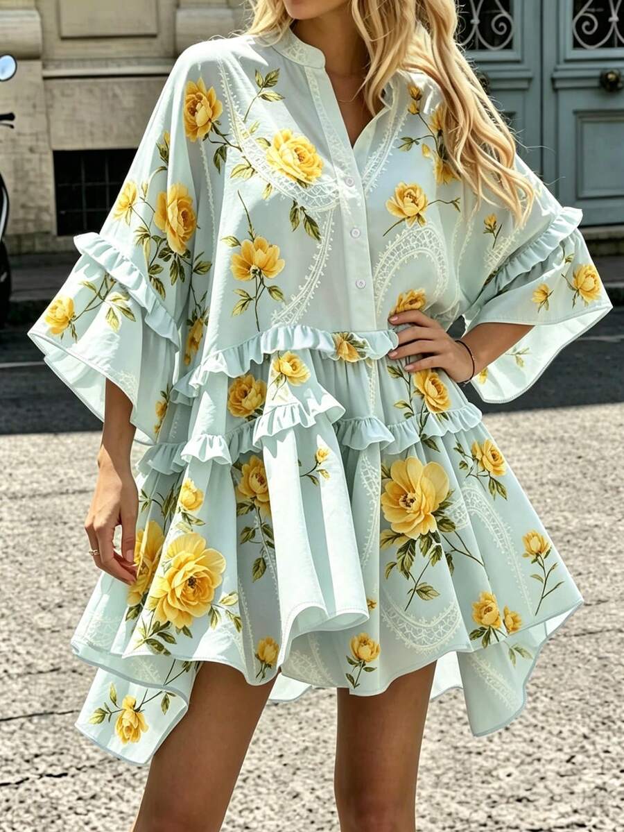 Full front view of mint floral button-placket mini dress with asymmetric ruffle hem