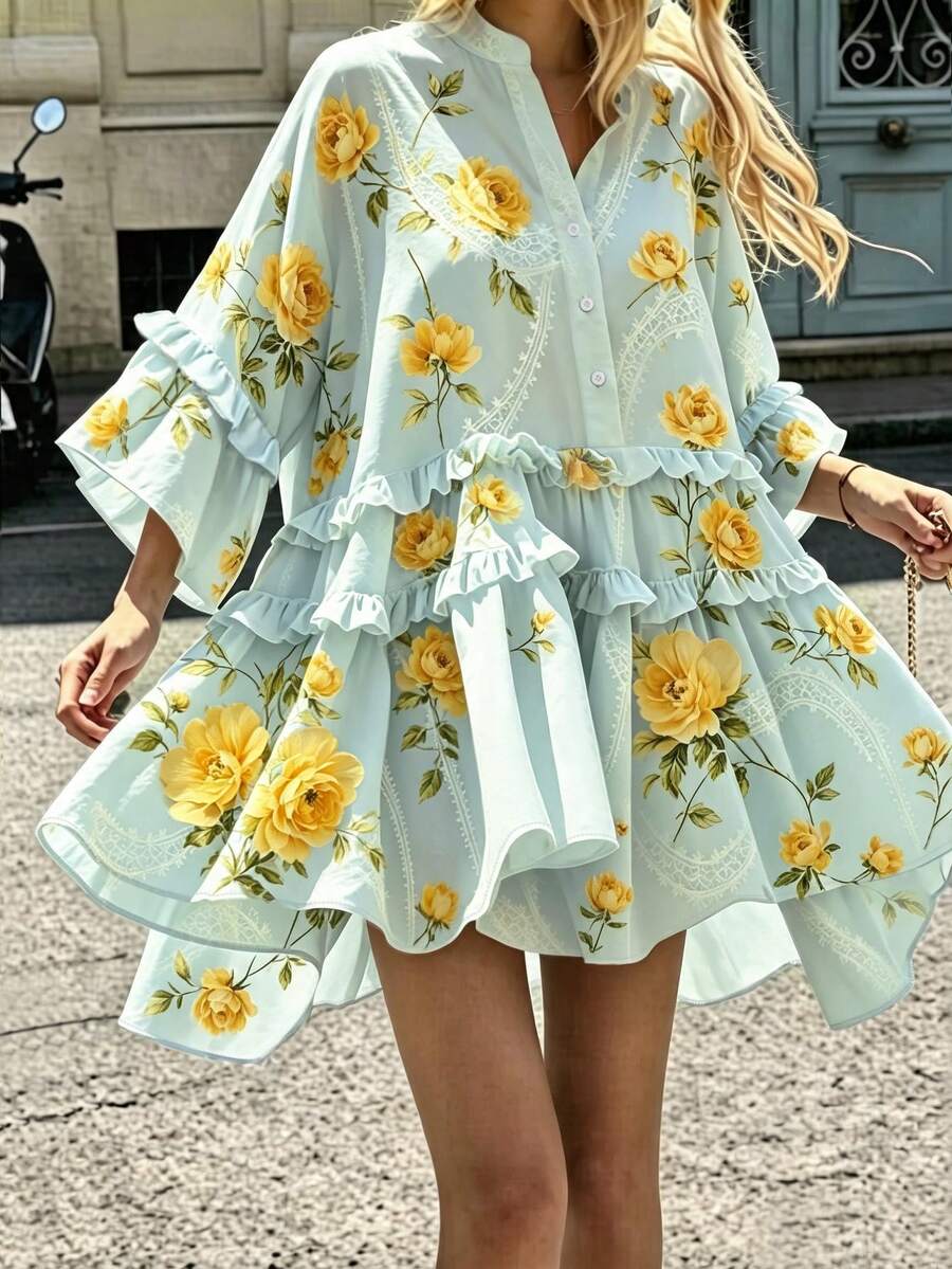 Front street view of mint floral bell-sleeve mini dress with tiered high-low ruffle hem
