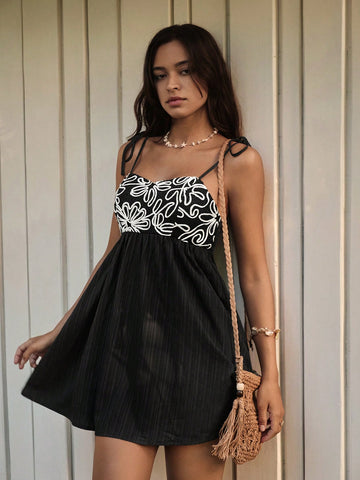 Embrace carefree vibes with this Bohemian Black Loose Strap Dress, your go-to for sunny seaside escapes. Its breezy, relaxed fit keeps you cool while the sleek black hue adds a touch of effortless chic. Perfect for spring and summer adventures, this dress lets you dance with the ocean breeze in style and comfort.