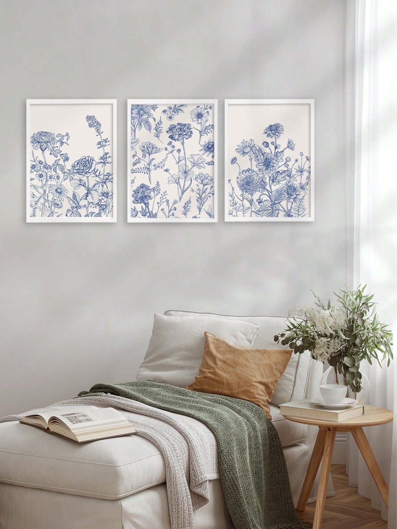 Add a touch of Bohemian Bliss to your wall with this stunning 3-piece frameless blue floral canvas art. The perfect addition to any aesthetic décor, these pieces are sure to elevate your space. (Frame not included.)