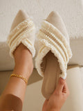 Elevate your vacation style with our Bohemian Bliss: Beige Pom Pom Ruffle Flats. The unique ruffle and pom pom details add a playful touch to any outfit, while the neutral beige color makes them easy to pair with any look. Perfect for a chic and comfortable vacation look.