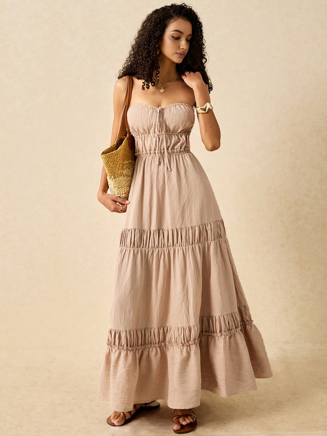 Effortlessly exude summer style in our Bohemian Bliss maxi dress. With its playful strappy design, flowy ruffle hem, and alluring open back, it's the perfect dress for any summer occasion. Be the envy of every party with this quirky and fun dress (and don't forget to take a twirl)!