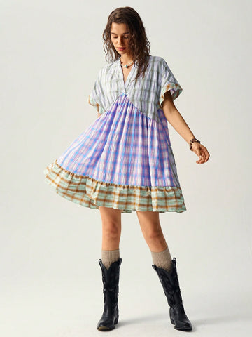 Add a pop of color to your summer with the Bohemian Bliss dress. Vibrant multicolor checkered patchwork creates a playful yet chic look. Perfect for any occasion - dress it up for a night out or keep it casual for a day at the beach. Get your boho vibe on!