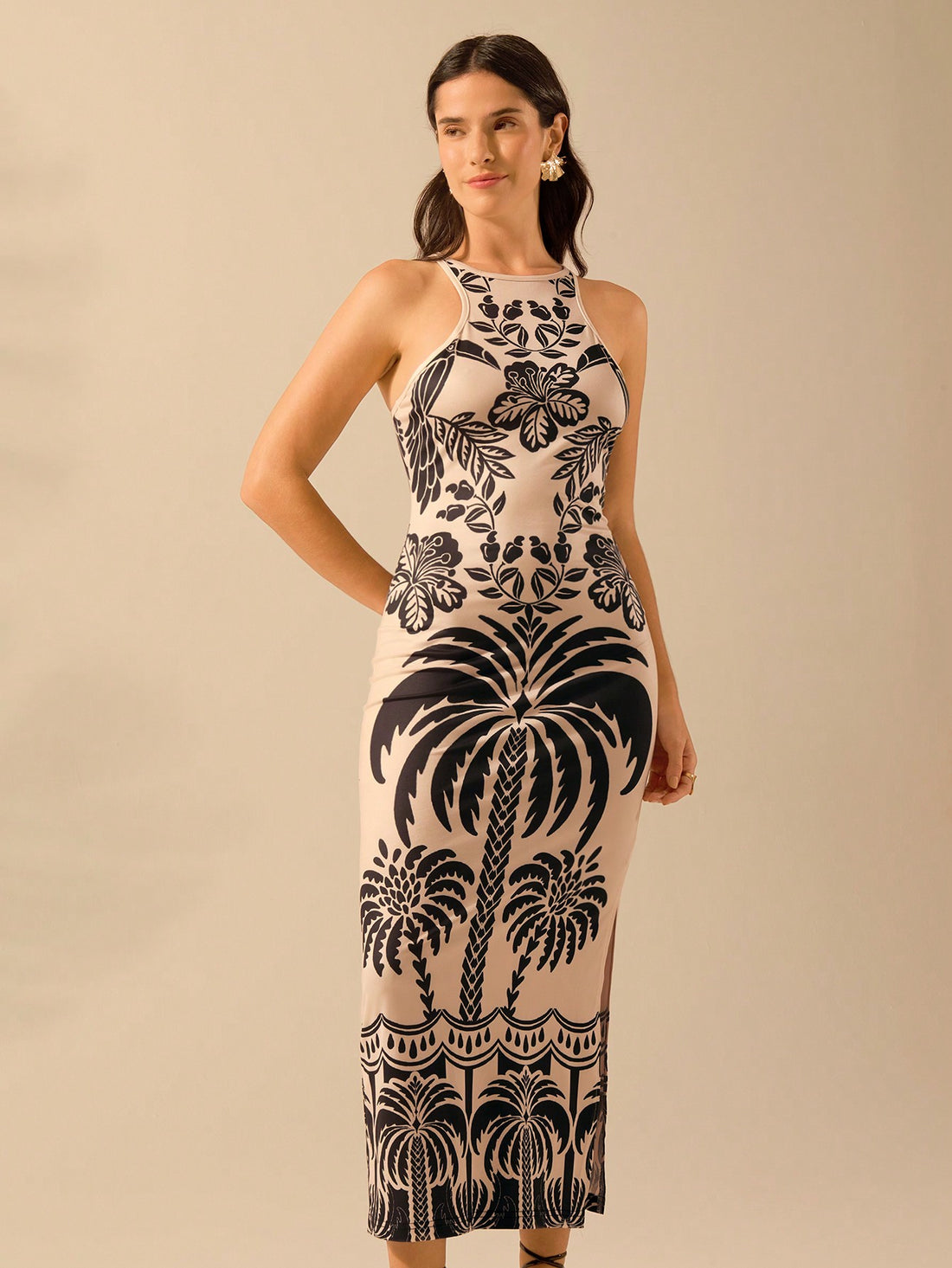 Get ready to feel like you're on a tropical vacation with our Bohemian Bliss dress! The sleeveless design and coconut tree print make it perfect for summer days. Soak up the sun in style and comfort. Smiles and good times sold separately.