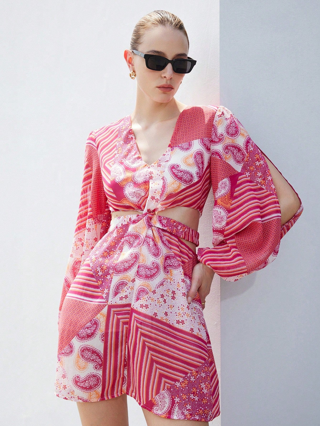 Step into summer with this playful Bohemian Chic chiffon mini dress, featuring airy lantern sleeves and a vibrant abstract print. Perfect for elegant vacations, its lightweight fabric keeps you cool while the unique design adds a fun, stylish flair to your sunny adventures.