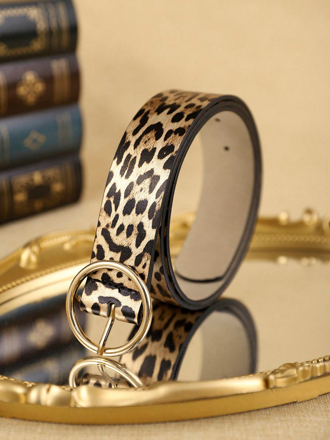 Elevate any outfit with our Bohemian Chic Multi-Color Leopard Print PU Waist Belt. The metal buckle adds a touch of polish while the bold print adds a pop of personality. Made with high-quality PU material, it is durable and stylish. Get ready to make a statement with this must-have accessory.