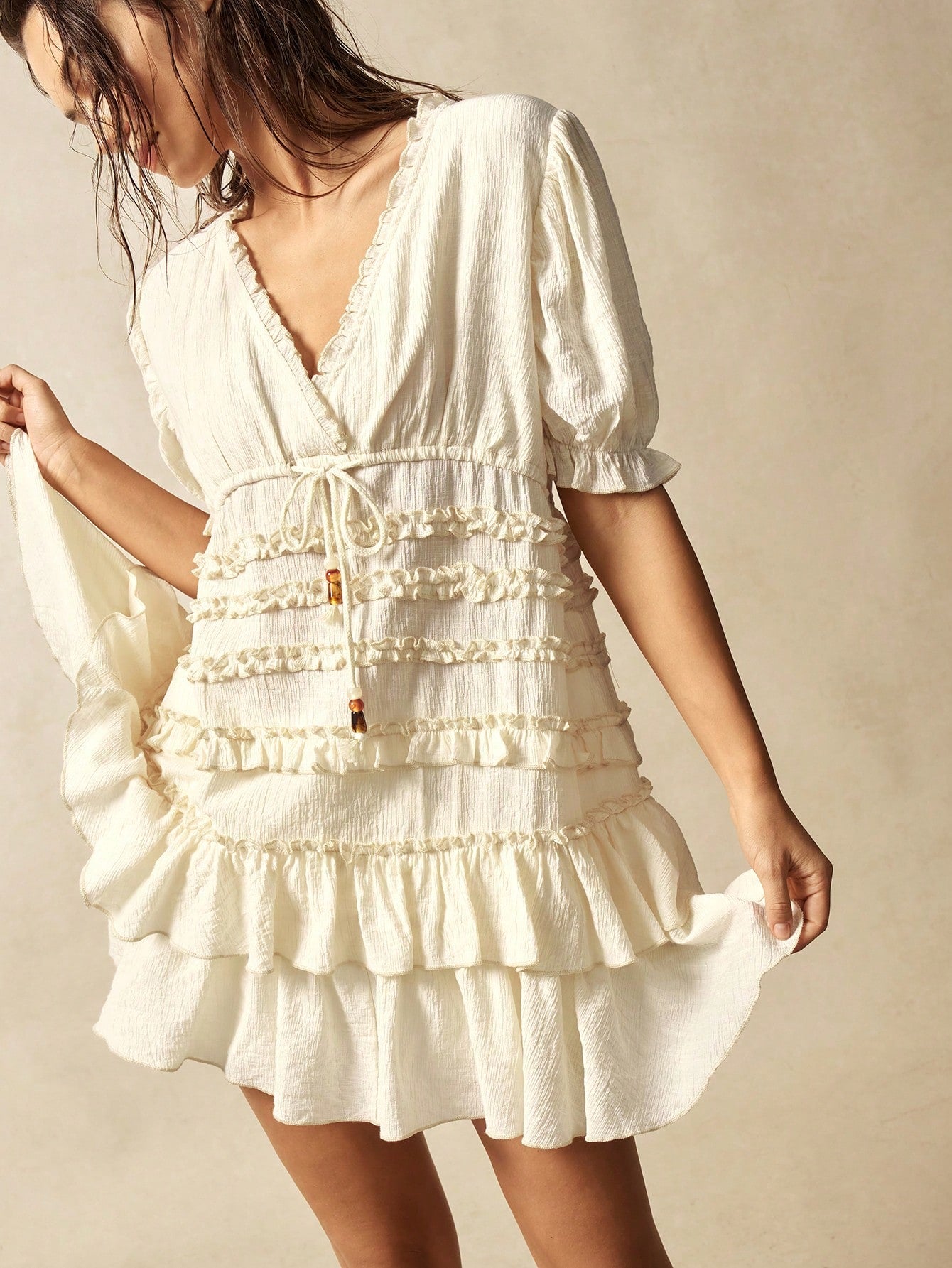 Step into effortless style with this Bohemian Chic mini dress. Featuring a flattering V-neck and short sleeves, it’s perfect for sunny days and casual outings. The playful ruffled hem adds a flirty touch that moves with you. Light and breezy, this dress is designed for fun, comfort, and easygoing moments wherever your day takes you.