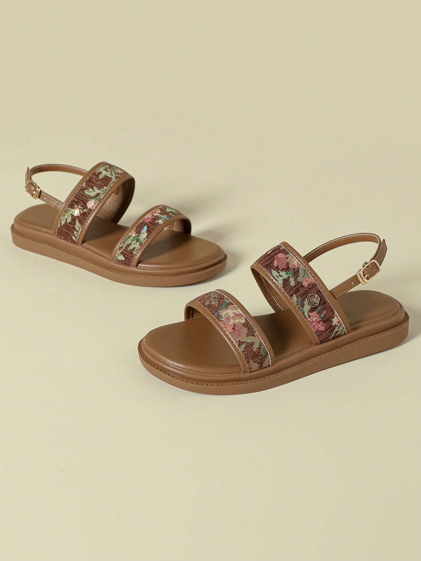 Step into summer with a playful twist! Our Bohemian Chic sandals feature a retro floral buckle design and a comfortable wedge heel for the perfect balance of style and comfort. Perfect for any sunny adventure, these sandals are sure to become your go-to choice for effortless and chic fashion.