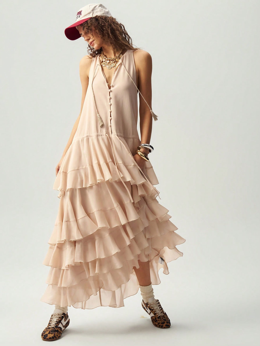 Step into summer with this playful sleeveless dress featuring a flattering V-neck and a solid color that’s perfect for mixing and matching. Its breezy design keeps you cool while adding a touch of bohemian charm to your look. Effortless style has never been this fun!