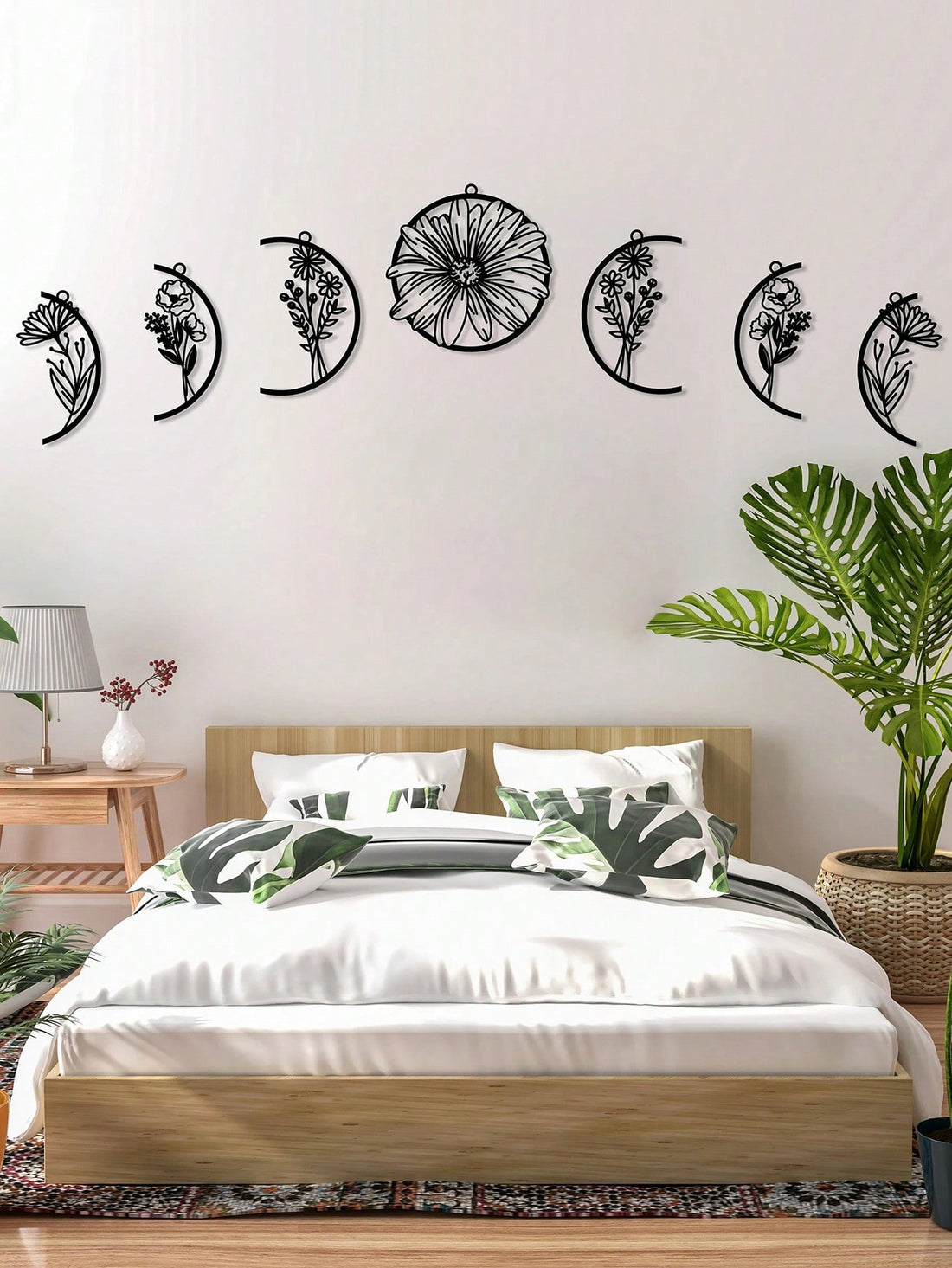 Transform your space with this stunning 7-piece bohemian wall art set featuring celestial moon phases and delicate floral designs. Crafted from durable iron with elegant gold metal accents, these pieces create a sophisticated, nature-inspired aesthetic perfect for bedrooms, living rooms, or any room needing a touch of boho charm. Easy to hang and arrange in your preferred configuration, this set brings together timeless celestial symbolism and botanical beauty for a cohesive, gallery-wall look that elevates