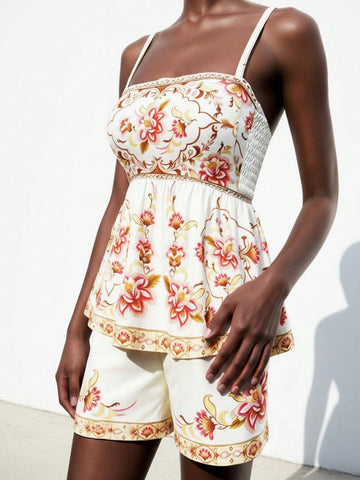 Escape to your own tropical paradise with this enchanting bohemian floral set. Featuring a breezy camisole paired with comfortable shorts, this duo effortlessly transitions from beachside getaways to laid-back weekend vibes. The vibrant botanical print brings wanderlust-worthy style to every moment, while the relaxed fit keeps you feeling free and fabulous. Perfect for those who crave effortless elegance without sacrificing comfort. Whether you're sipping cocktails by the pool or running errands around town