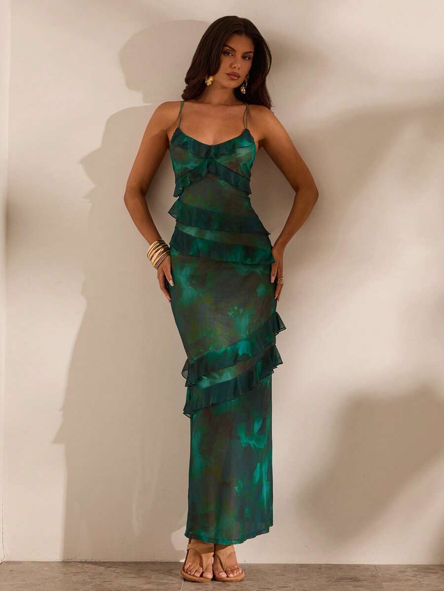 4 media show green teal abstract floral mesh maxi dress with spaghetti straps, crisscross open back, back tie, sheer overlay, ruffle trim across bust waist hips and skirt, bodycon mermaid shape. image 1