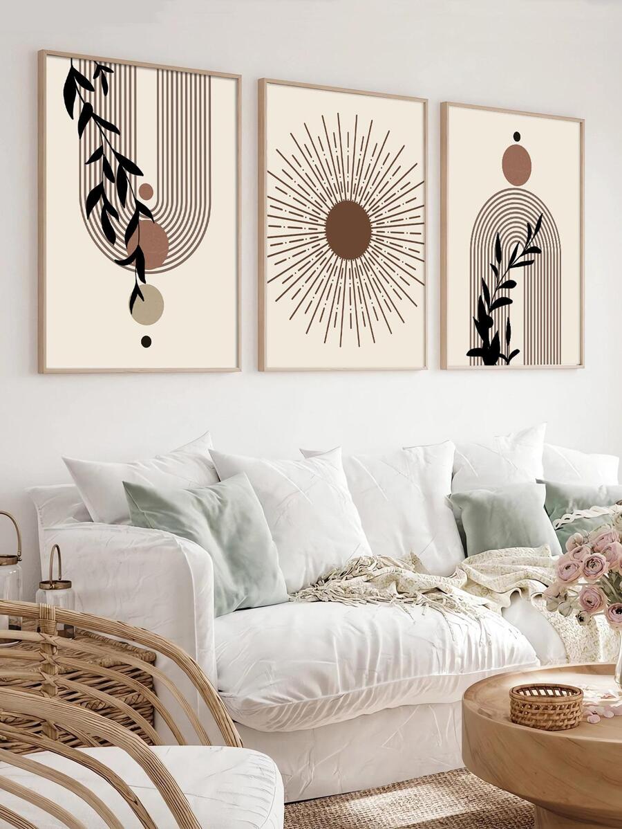 Living room mockup of three bohemian sun and botanical prints in light wood display frames
