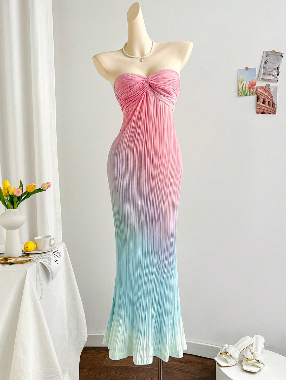 Get ready to be the most stylish and carefree festival-goer or vacationer in our Bohemian Ombre Pleated Twist Bandeau Dress! With a unique twist on the classic bandeau style, this dress features a playful ombre design and pleated details that will have you standing out from the crowd. Perfect for dancing, lounging, and taking fun pictures.