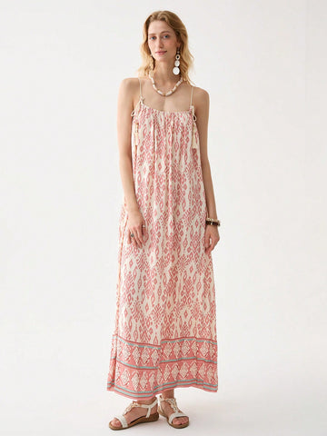 Twirl into the season with our Bohemian Spaghetti Strap Tassel Dress! This flirty number dances with every step thanks to its playful tassels and breezy silhouette. Thin straps keep you cool while the boho-chic design turns heads at beach parties, festivals, or casual brunches. Slip it on, add sandals, and voilà – instant summer vibes without even trying!