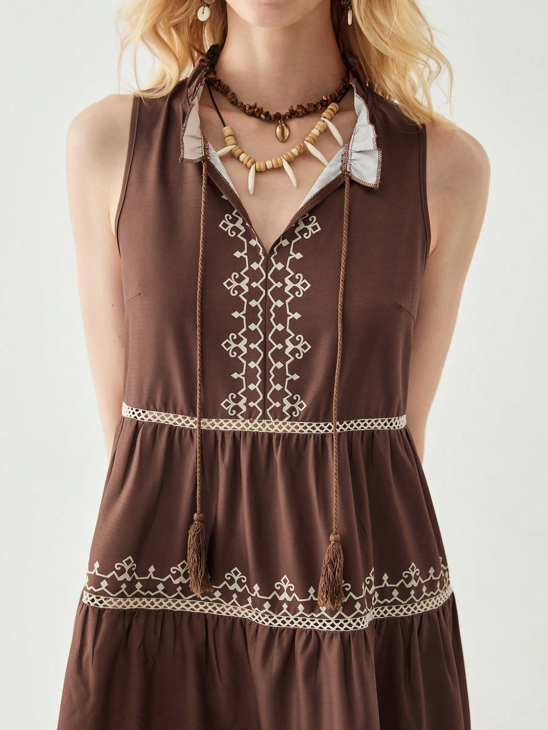 Embrace your free spirit in this flirty Bohemian lace mini dress! With a flattering V-neck and sleeveless design, you'll stay cool while turning heads. The delicate lace details add just the right touch of whimsy to your spring and summer adventures. Dress it up with heels or keep it casual with sandals – either way, you'll be the life of every sunny-day party!