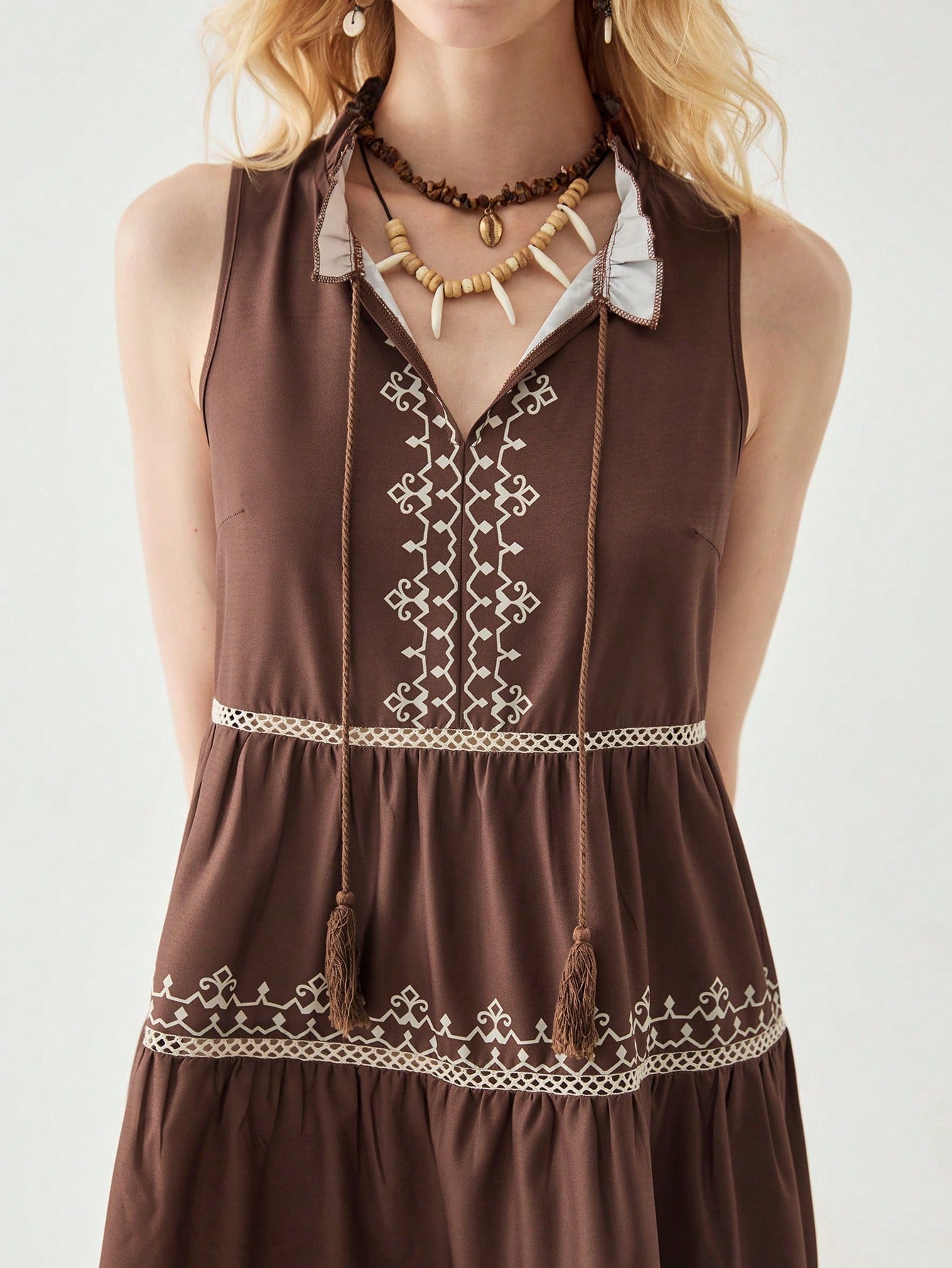 Embrace your free spirit in this flirty Bohemian lace mini dress! With a flattering V-neck and sleeveless design, you'll stay cool while turning heads. The delicate lace details add just the right touch of whimsy to your spring and summer adventures. Dress it up with heels or keep it casual with sandals – either way, you'll be the life of every sunny-day party!