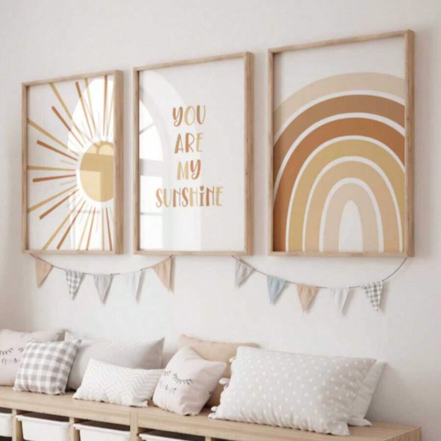 Three boho nursery art prints with a smiling sun, You Are My Sunshine typography, and retro rainbow above a bench