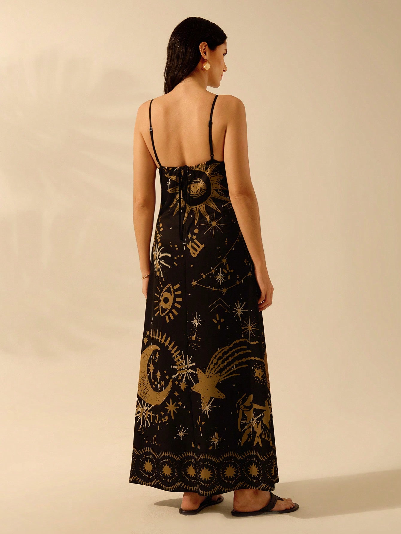 Introducing Boho Bliss: the epitome of summer fun! With its tropical star and moon print and sleeveless design, this beach dress will keep you looking and feeling cool all season long. Whether you're lounging on the sand or dancing under the stars, this dress is sure to make you the center of attention. Get your summer bliss on now!