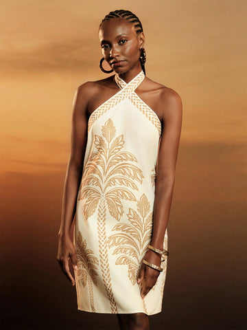 Get ready for a summer full of fun and fashion with our Boho Chic Coconut Tree Criss-Cross Halter Dress! This dress is perfect for all your beach getaways, featuring a unique criss-cross halter design and a playful coconut tree print. Stay stylish and comfortable all season long!