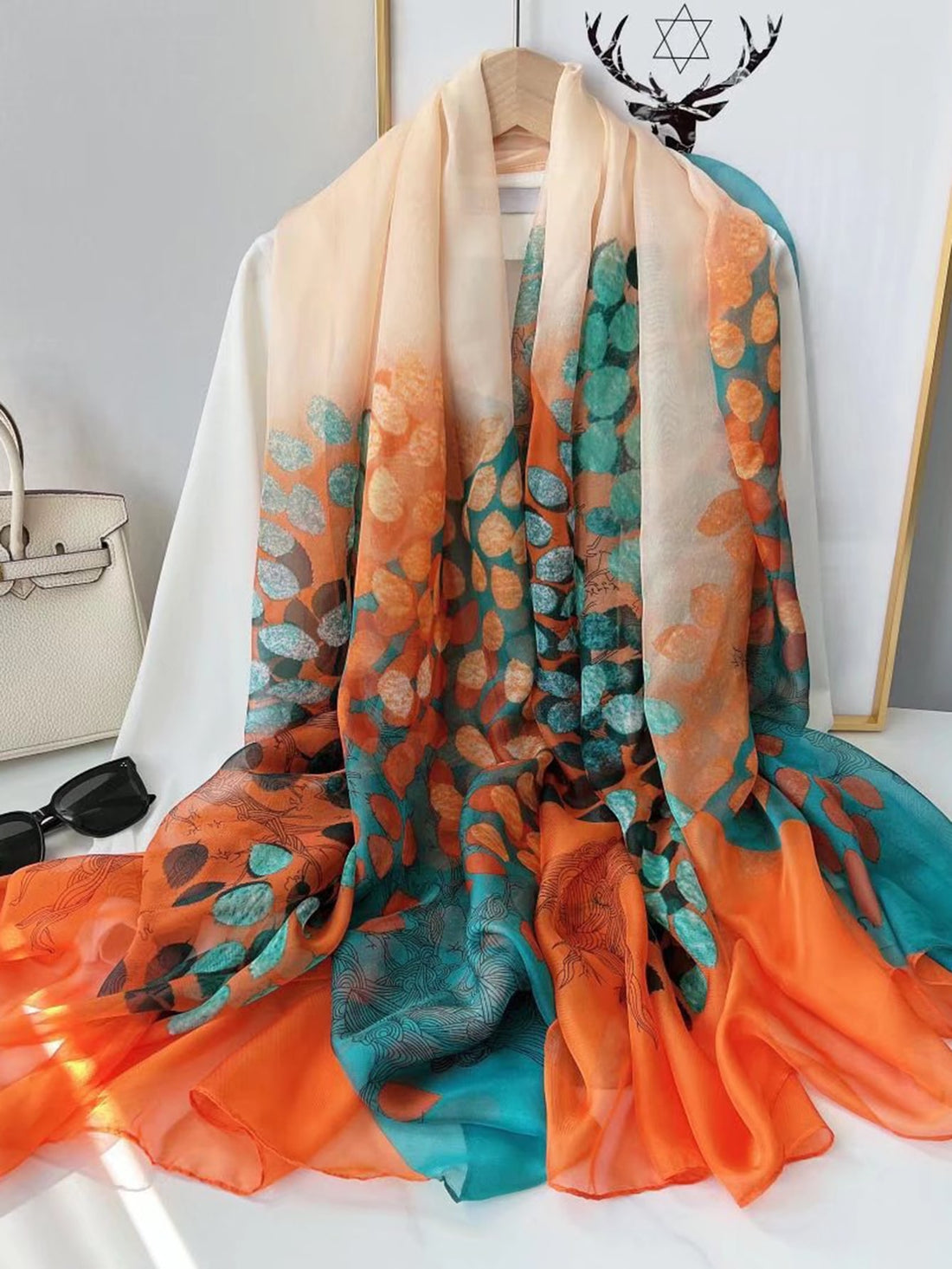 Upgrade your daily style with our Boho Chic Leaf Pattern Scarf. This versatile accessory features a trendy bohemian leaf pattern, perfect for adding a touch of elegance to any outfit. Made with high-quality material, this scarf will keep you looking stylish and feeling comfortable all day long.