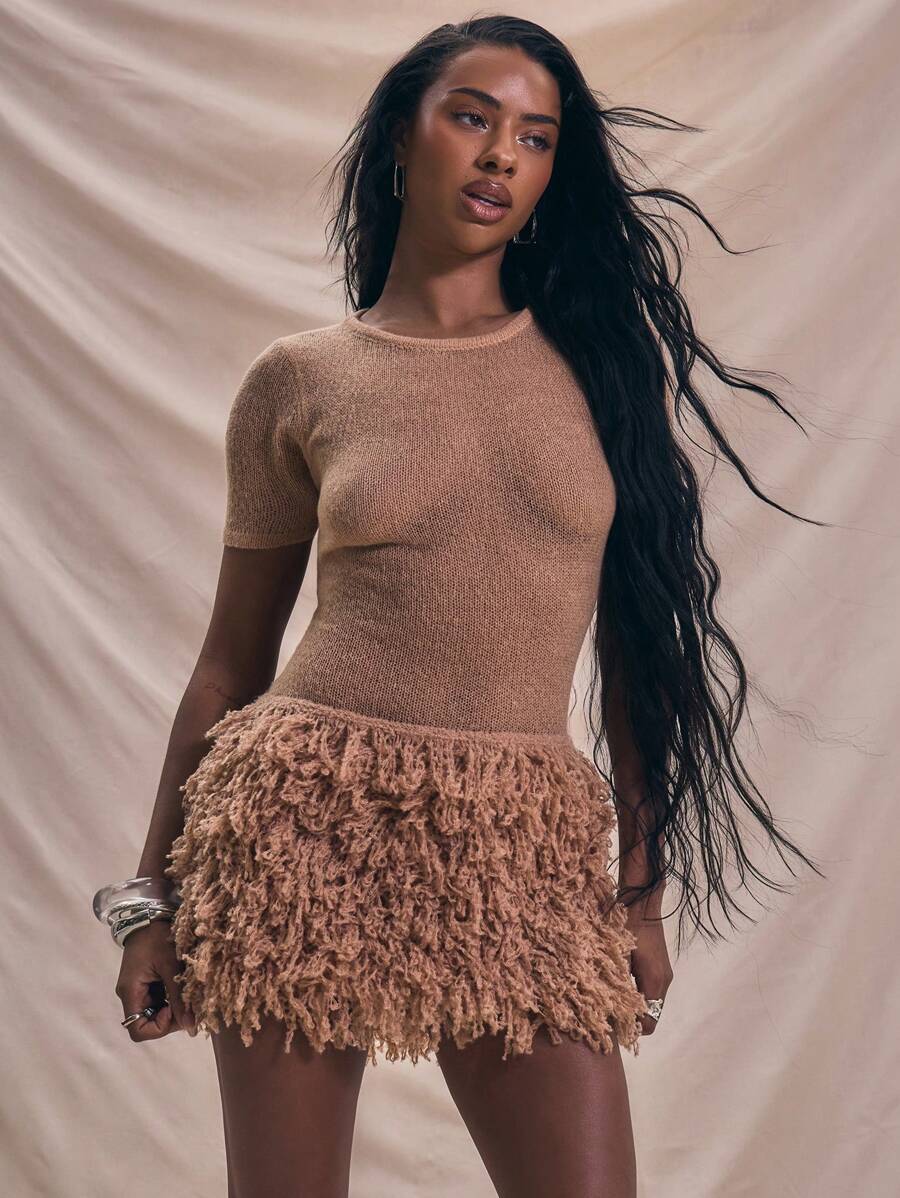 Step into effortless charm with this Boho Chic Lightweight Fitted Mini Dress, perfect for turning heads at elegant nights out or cozy holiday gatherings. Its airy fabric keeps you comfortable while the flattering fit highlights your silhouette with playful ease. Ready to dance, laugh, and celebrate in style? This dress is your new go-to for memorable moments.