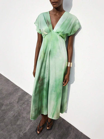 Embrace effortless style with this Boho Chic Multi-Color Tie-Dye Asymmetric Dress. Its playful tie-dye pattern and unique asymmetric cut make it perfect for beach days, festival fun, or dancing at weddings. Light and breezy, it moves with you, keeping your look fresh and vibrant wherever you go.