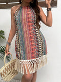 Dress up for your next beach vacation in this Boho Chic halter neck dress. With a tassel hem and vibrant print, this plus size dress is perfect for a day out in the sun. So go ahead and make a statement, because you deserve to look and feel your best!