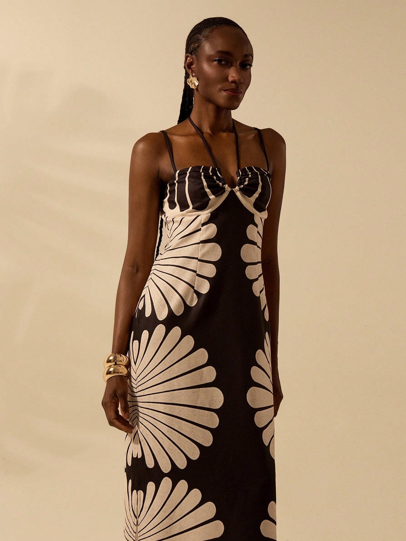 Get ready to rock the beach in this Boho Chic Shell Print Dress that exudes effortless summer style. With its delicate spaghetti straps and playful shell print, you'll be the epitome of bohemian beauty. Perfect for soaking up the sun and sipping on a margarita. (Sunglasses and beachy waves not included!)