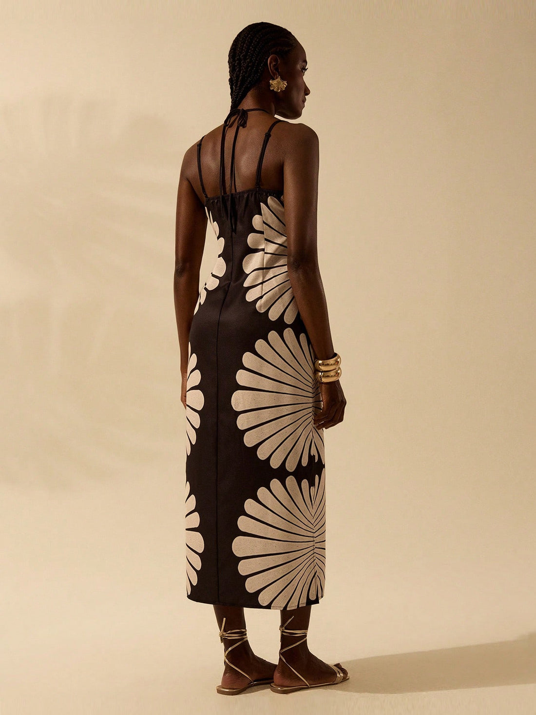 Get ready to rock the beach in this Boho Chic Shell Print Dress that exudes effortless summer style. With its delicate spaghetti straps and playful shell print, you'll be the epitome of bohemian beauty. Perfect for soaking up the sun and sipping on a margarita. (Sunglasses and beachy waves not included!)