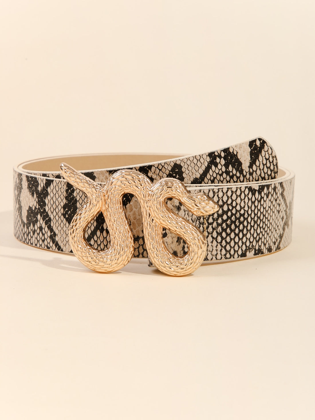 This boho chic snakeskin pattern buckle belt is the perfect accessory for Halloween. Its unique design adds a touch of edginess to any costume, while its versatile style makes it a great addition to your everyday wardrobe. Made with high-quality materials, this belt will surely make a statement.