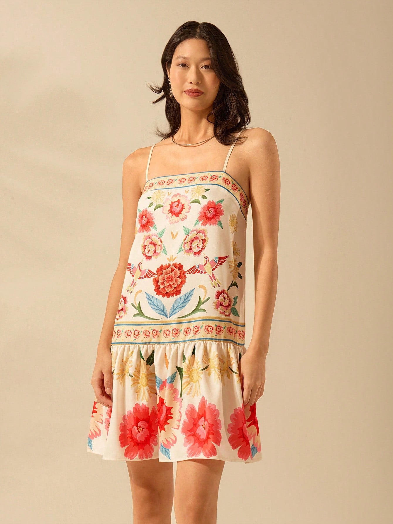 Embrace your inner bohemian with our Boho Chic Tropical Floral Mini Dress! Featuring spaghetti straps and a vibrant floral print, this dress is perfect for beach vacations. Light, flowy, and effortlessly stylish, it's the perfect addition to any summer wardrobe. (Perfect for embracing your free-spirited side!)