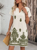 Front view of Boho Chic Women's Summer Mini Dress - Casual Retro Print for Holiday & Daily Wear for women dress styling