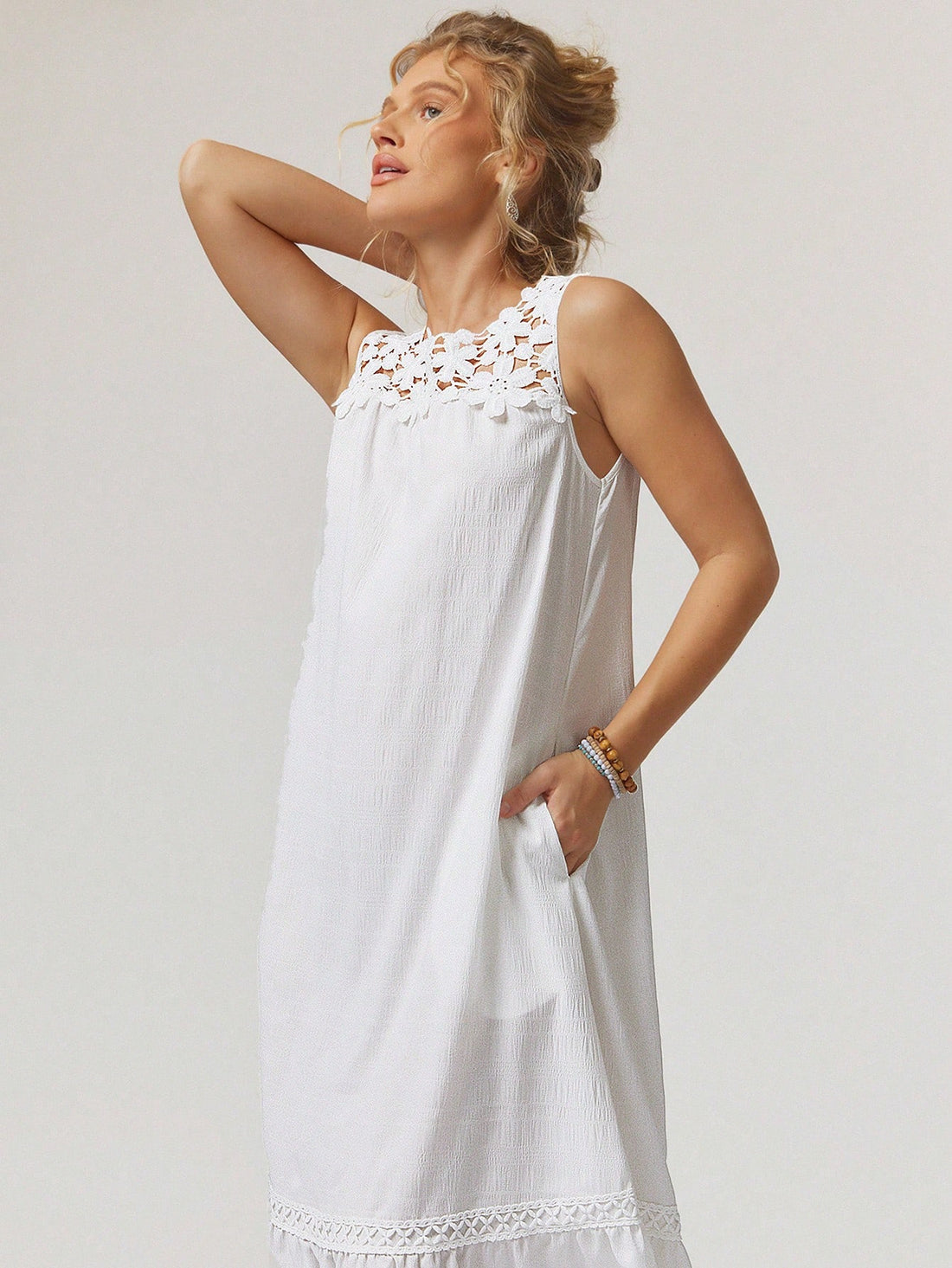 Escape to your own paradise in this effortless white summer dress that's basically a vacation in fabric form. The flowy, loose silhouette moves with you (not against you), while hidden pockets solve the eternal question of where to stash your sunglasses and snacks. Perfect for beach days, garden parties, or that spontaneous adventure you've been dreaming about. Boho vibes, zero fuss, maximum comfort—because looking good shouldn't feel like work.