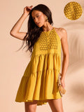 Brighten your summer days with this playful yellow halter dress, perfect for effortless boho chic vibes. Its breezy design keeps you cool while turning heads, making it your go-to for sunny adventures and casual outings. Embrace easy style and sunny moods all season long!