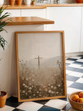 Wood framed Christian cross and white wildflower meadow canvas leaning in a kitchen