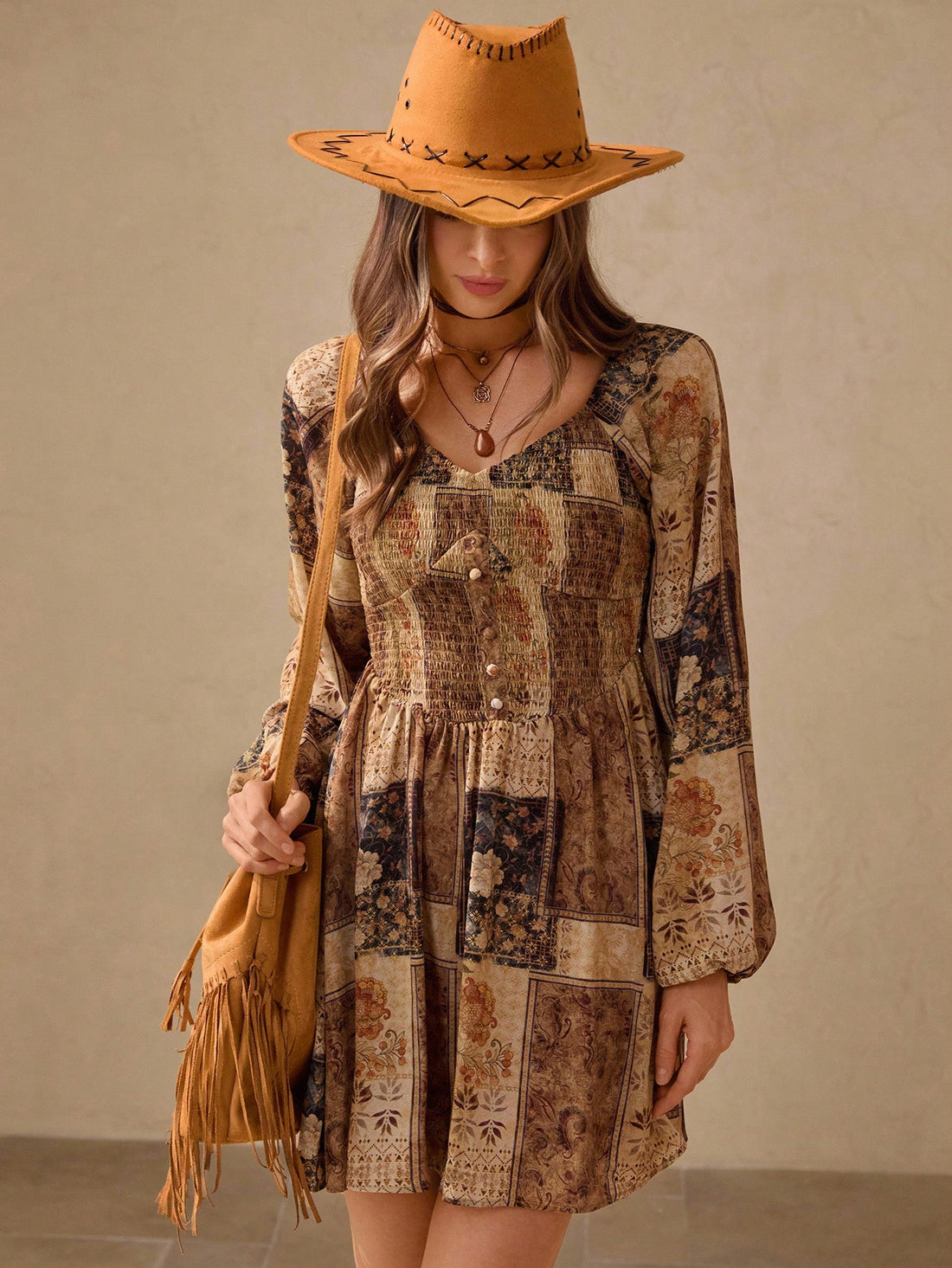 Embrace the carefree spirit of fall with this Boho Floral Print Backless Mini Dress. Featuring earthy tones and long sleeves, this babydoll dress merges comfort with a flirty vibe. Perfect for concerts or vacations, its playful backless design adds a touch of charm that keeps you dancing and turning heads wherever you go.