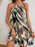 Make a statement with our Boho Halter Vacation Dress! This stylish graphic print summer dress is perfect for beach getaways. The A-hem design adds a playful touch, making it a must-have for your vacation wardrobe. Embrace your carefree spirit with this unique dress.