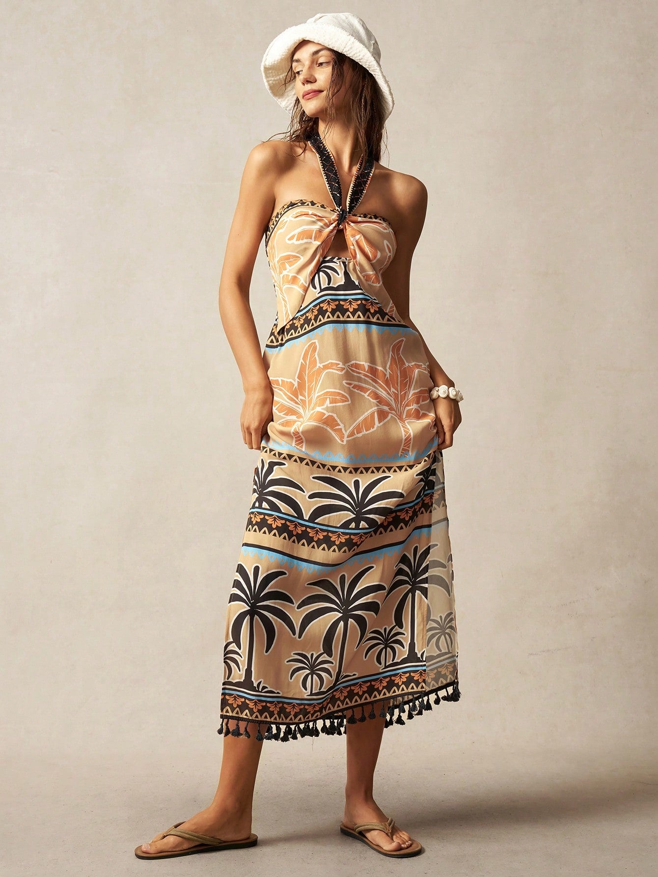 Step into summer with the Boho Holiday Keyhole Split Dress, designed to turn heads with its playful charm. This fitted mid-length dress features a flirty keyhole detail and a daring split, perfect for warm days and breezy nights. Its chic boho vibe makes it an effortless choice for beach strolls, garden parties, or casual outings where style meets comfort. Embrace the season with a dress that’s as fun and free-spirited as you are!