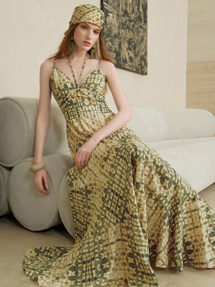 Embrace sunny days in this Boho Printed Camisole Dress, designed with a flattering cinched waist that dances with every breeze. Its flowy silhouette makes it the perfect companion for beach vacations or casual summer strolls. Light, breezy, and effortlessly stylish—this dress brings playful charm to your warm-weather wardrobe.