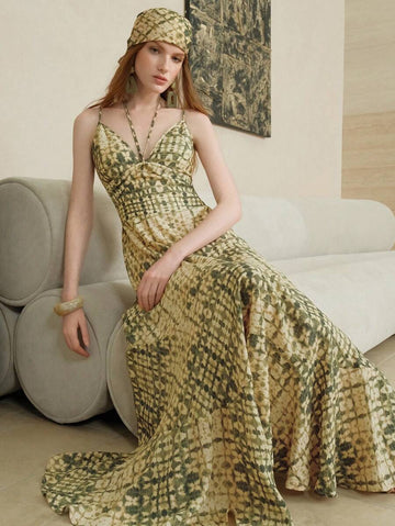 Embrace sunny days in this Boho Printed Camisole Dress, designed with a flattering cinched waist that dances with every breeze. Its flowy silhouette makes it the perfect companion for beach vacations or casual summer strolls. Light, breezy, and effortlessly stylish—this dress brings playful charm to your warm-weather wardrobe.