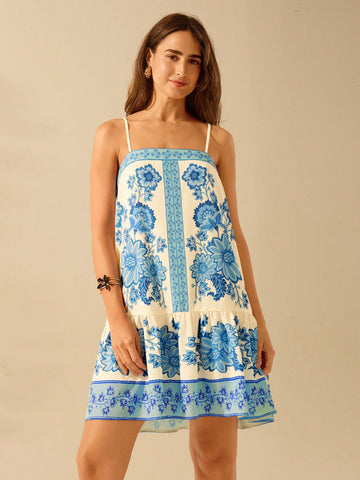 Get ready for some serious summer vibes with this Boho Tropical Floral Blue Print Dress! Featuring a flowy spaghetti strap design and a playful backless cut, this dress is perfect for those warm days. Plus, the stunning print adds a touch of tropical flair to your wardrobe. Get yours now!