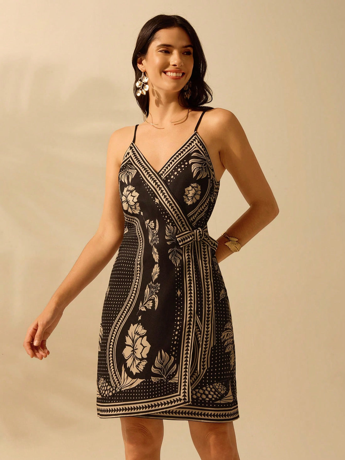 Turn heads and feel carefree in our Boho Tropical Floral Cami Dress! Its wrap design flatters every figure, while the vibrant print is perfect for summer vacations. Slip it on for effortless, stylish beachwear.