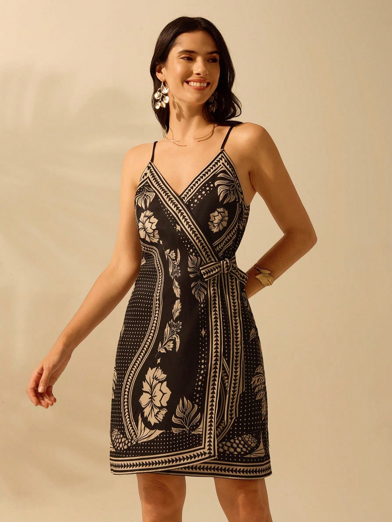 Turn heads and feel carefree in our Boho Tropical Floral Cami Dress! Its wrap design flatters every figure, while the vibrant print is perfect for summer vacations. Slip it on for effortless, stylish beachwear.