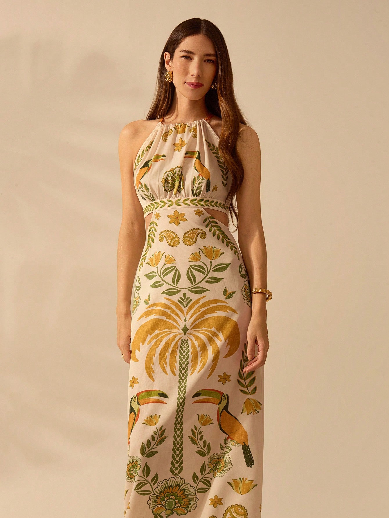 Get ready for a tropical adventure in our Boho Tropical Paradise Halterneck Dress! With a vibrant Rhododendron and Toucan print, you'll stand out while staying cool and comfortable. Perfect for summer fun and relaxation.