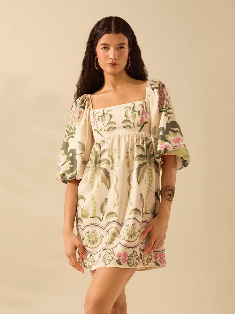 Embrace sunny vibes with this Boho Tropical Print Summer Dress, featuring playful coconut trees and colorful parrots. The airy lantern sleeves add a breezy, carefree feel perfect for beach days or casual outings. Lightweight and fun, this dress brings a splash of island charm to your summer wardrobe.